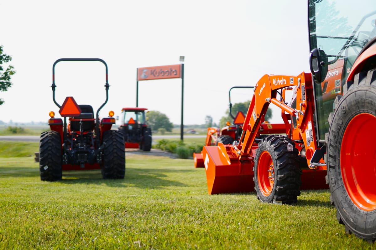 Kubota tractors displayed in front of Wolf Kubota dealership